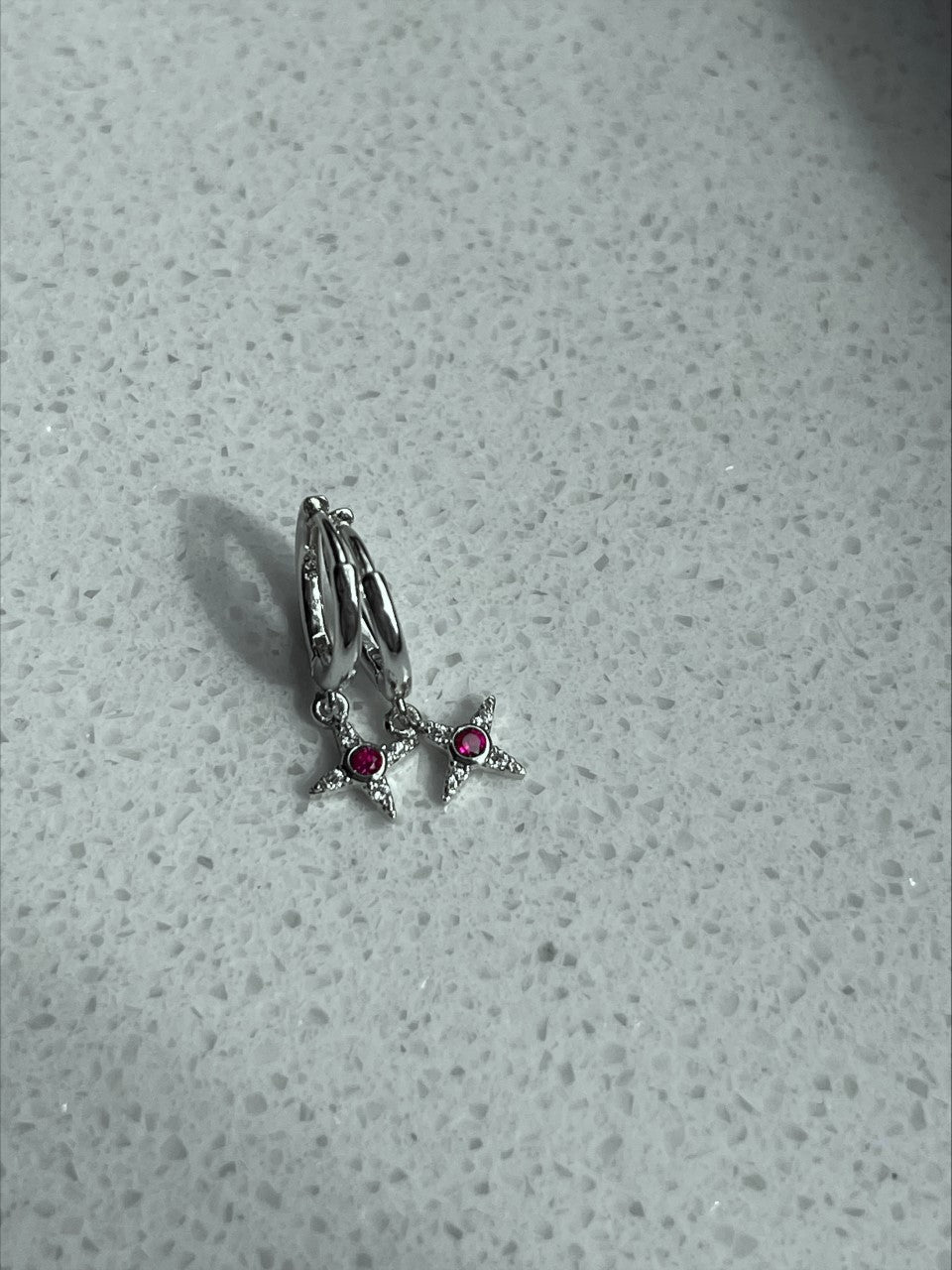 Ster hanger met roze steen