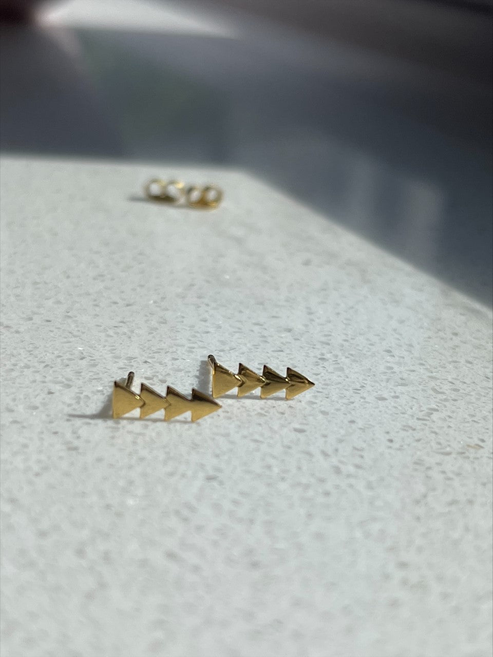 Triangle studs